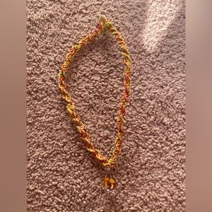 Mushroom pendant necklace.